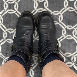 Navy UGG combat boots with shearling lining